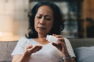 woman taking medication